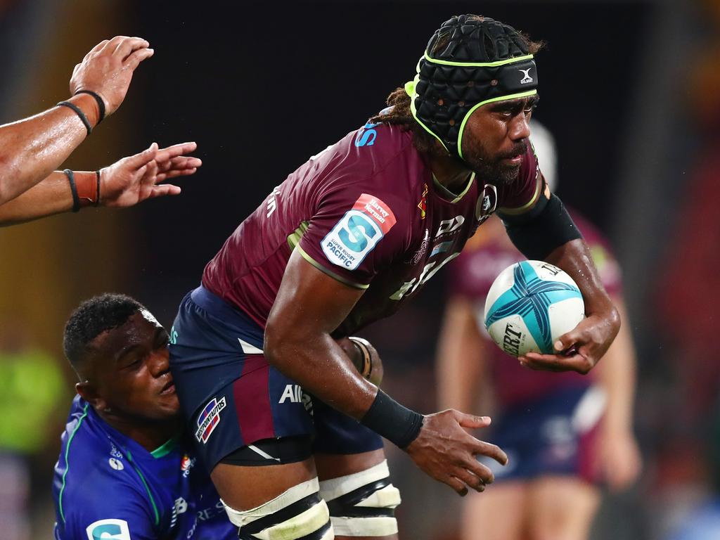 Reds flanker Seru Uru is tackled during Queensland’s win over Fijian Drua. Picture: Chris Hyde/Getty Images