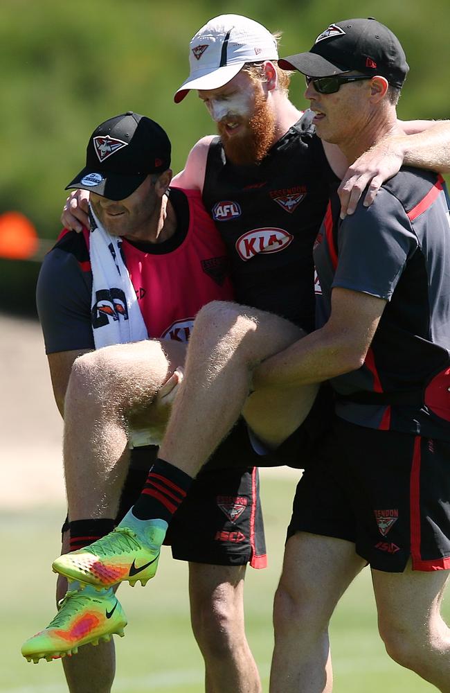 Francis is carried from the ground. Picture: Wayne Ludbey