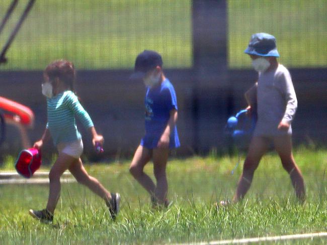 Evacuees have been given sunscreen as well as shorts, singlets and thongs. Picture: AAP