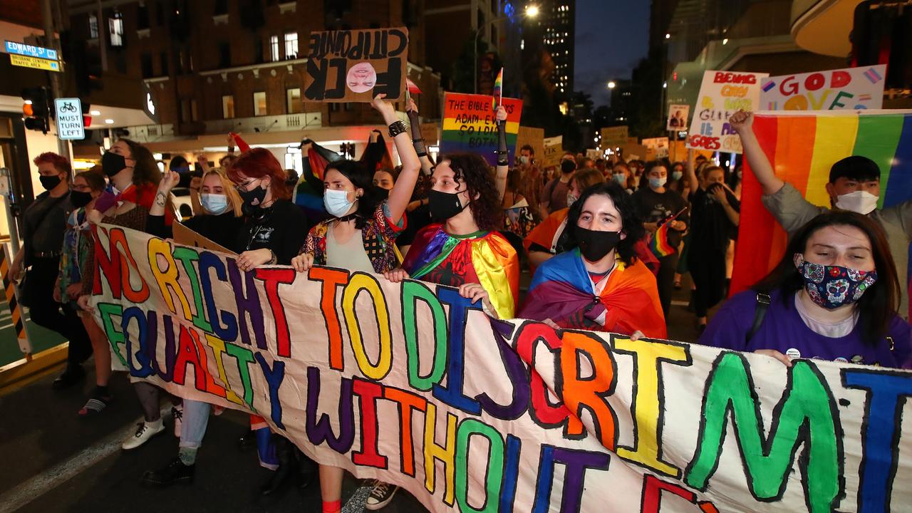 Protesters march to protest discrimination after Citipointe Christian College asked its students to sign an enrolment contract agreeing to their biological gender. Picture: Jono Searle/Getty Images