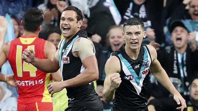 Port Adelaide’s Connor Rozee, right, celebrates a goal with Steven Motlop. Picture: Sarah Reed