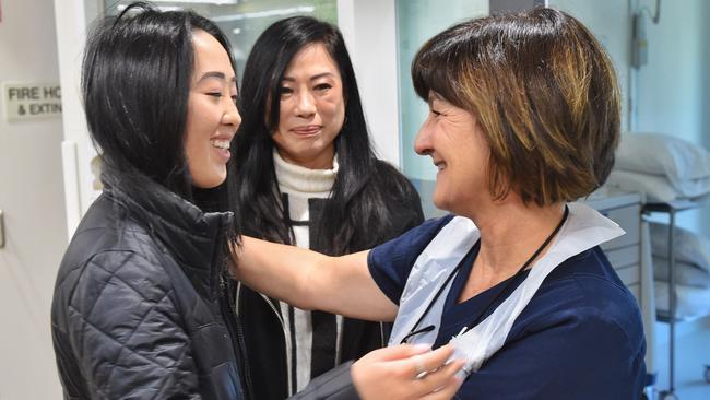 Erin returned to visit the ICU staff at the Royal Melbourne Hospital with her mum. Picture: Tony Gough