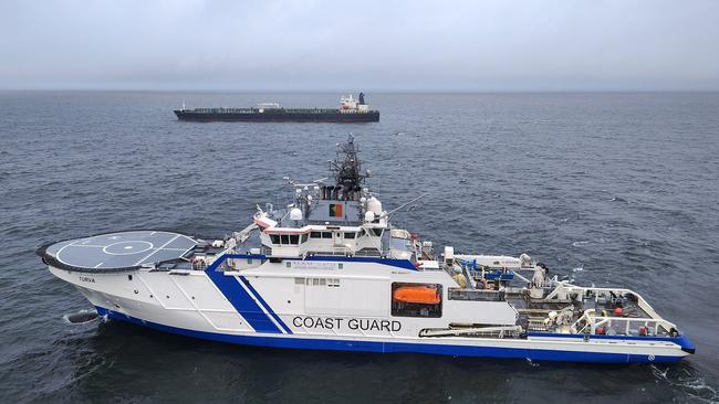 A Finnish Border Guard's ship Turva and the oil tanker Eagle S. Picture: AFP/Finnish Border Guard