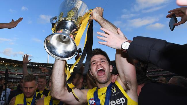 Cotchin with the spoils of victory. Picture: Getty Images