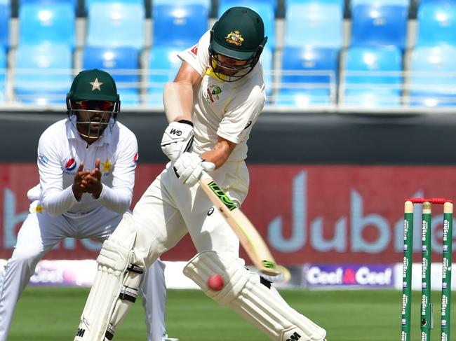 Travis Head on his way to a vital 72 to help Australia save the first Test against Pakistan. Picture: AFP