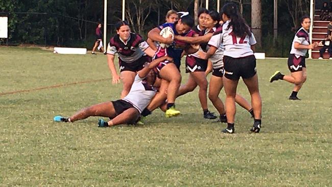 Malaela Su'a is tackled by Marsden SHS.