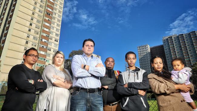 Concerned residents outside a public housing tower in Fitzroy that was feared to have poor fire safety. Picture: Hamish Blair