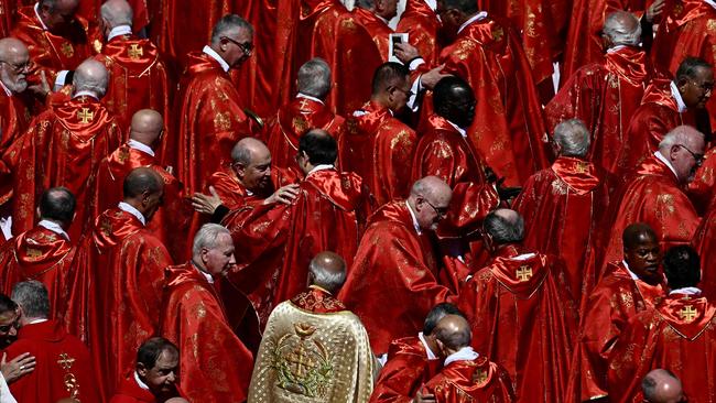Cardinals embrace after Pope Francis' funeral ceremony at St Peter's Square. Picture: AFP