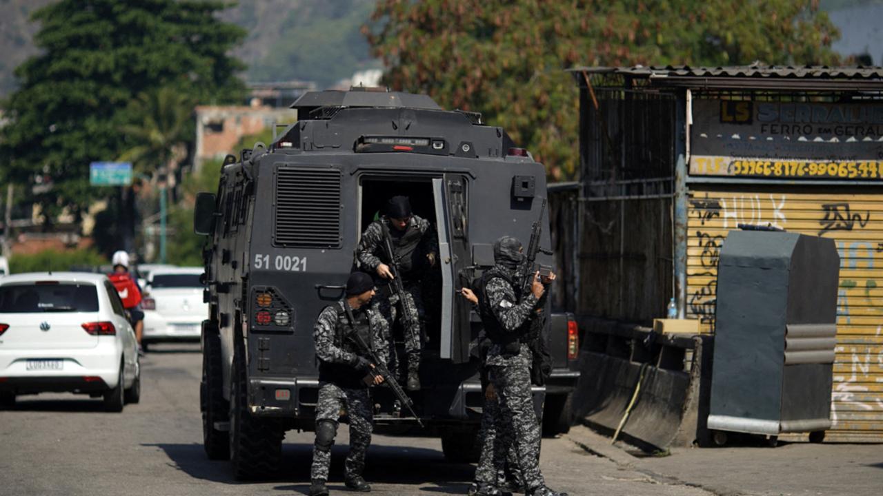 Rio's Civil Police officers are seen during a police operation against drug traffickers at the Jacarezinho favela. Picture: Mauro Pimentel/AFP