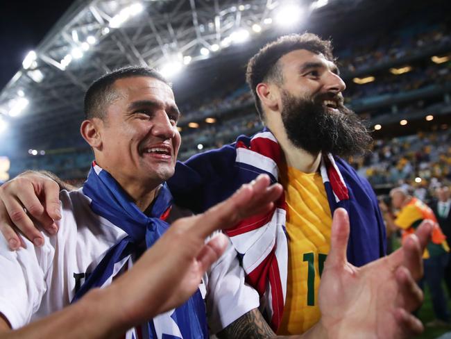 Tim Cahill (L) and Mile Jedinak (R) celebrate the win.