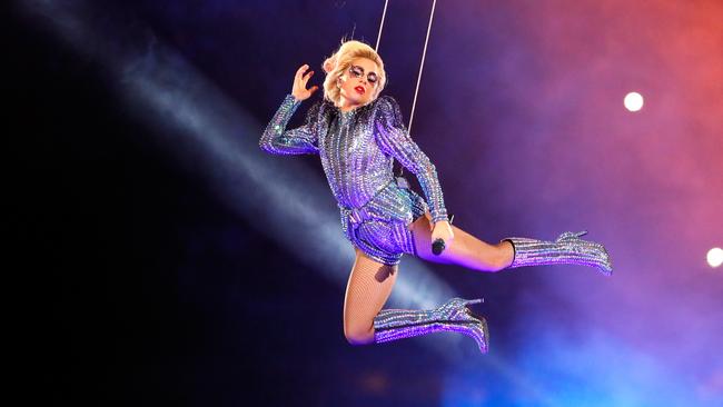 Lady Gaga makes a stunning entrance. Picture: Getty