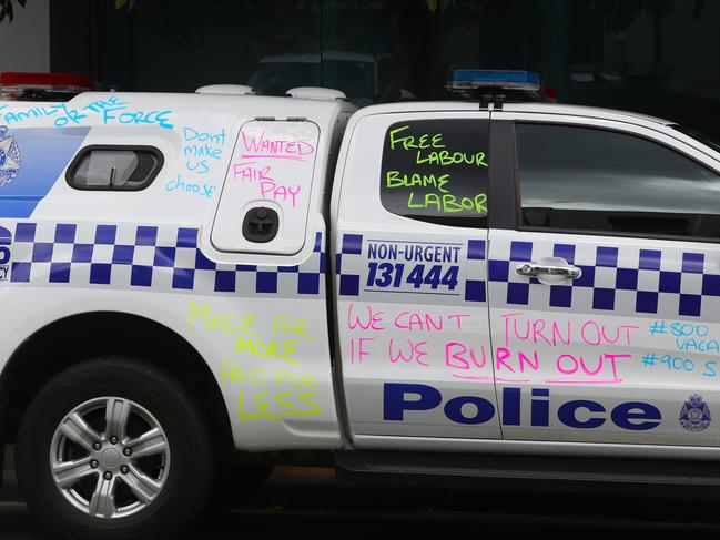 Police cars marked up amid the pay dispute. Picture: David Crosling