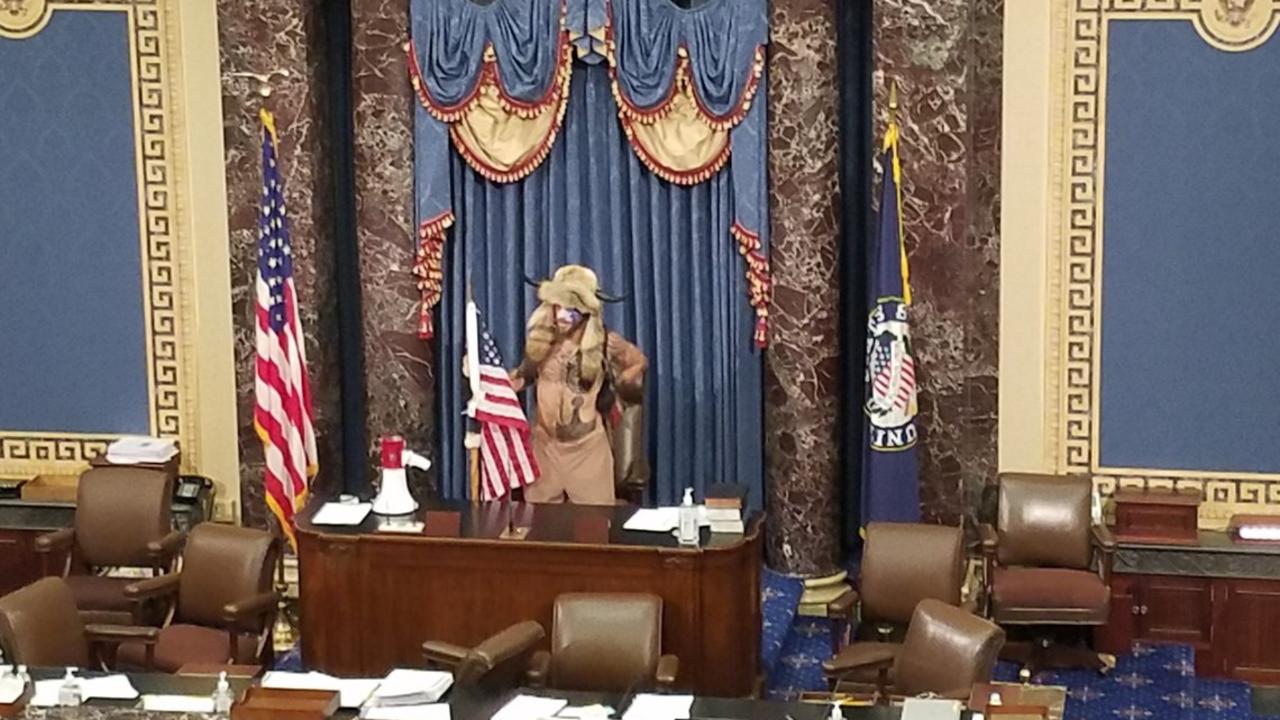 Hardcore Trump supporter Angeli invades the Senate chamber during the US Capitol protests on Wednesday.