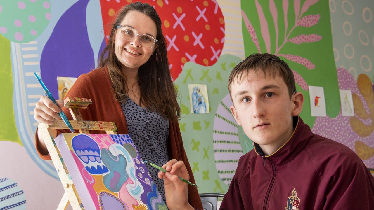 Local artist Alex Stalling shares her passion and expertise with George Storie. Deaf and hard of hearing teenagers will learn how to communicate artistically in a workshop designed to develop their creativity. Picture: Nev Madsen.