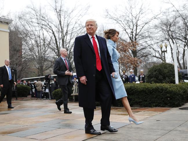 President-elect Donald Trump and his wife Melania walk to their vehicle after attending church service at St. John’s Episcopal Church across from the White House in Washington on January 20, 2017. Picture: AP