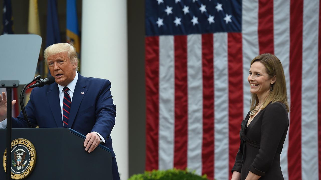 Donald Trump with Judge Amy Coney Barrett. Picture: Olivier Douliery/AFP