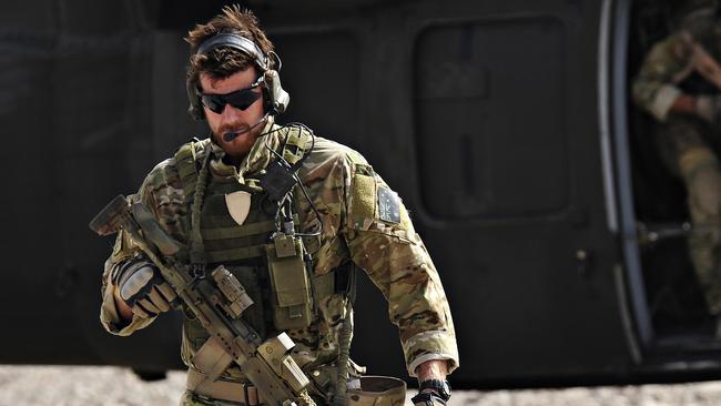 SAS Corporal Ben Roberts-Smith leaves a UH-60 Blackhawk helicopter during preparation of the Shah Wali Kot offensive in Afghanistan in 2010.