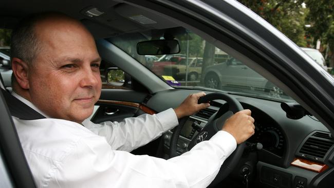 Tim Pallas behind the wheel of a Toyota, but he actually prefers the luxury of a Lexus.