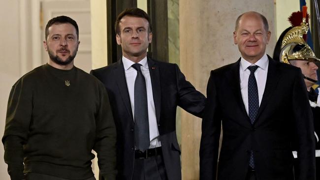 Emmanuel Macron is flanked by Mr Zelensky and Olaf Scholz at the Elysee Palace in Paris. Picture: AFP