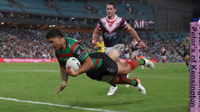 Latrell Mitchell dives over for his try. Picture: Matt King/Getty Images