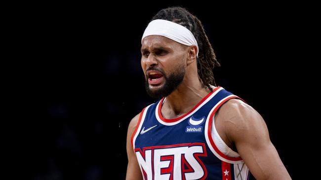 NEW YORK, NEW YORK - JANUARY 26: Patty Mills #8 of Brooklyn Nets reacts against the Denver Nuggets at Barclays Center on January 26, 2022 in the Brooklyn borough of New York City. NOTE TO USER: User expressly acknowledges and agrees that, by downloading and or using this photograph, User is consenting to the terms and conditions of the Getty Images License Agreement. (Photo by Michelle Farsi/Getty Images)