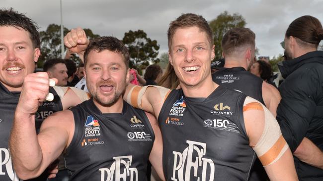 Trent Heffernan, Sam Gray and Matt Rose celebrate the win. Picture: Brenton Edwards