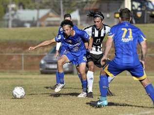 IN CONTROL: USQ FC player Kodi Bailey shields the ball. Picture: Kevin Farmer