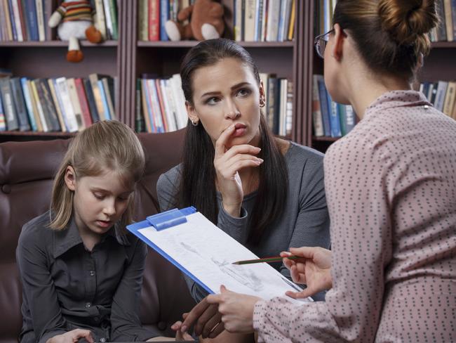 RendezView. Young mom with her daugher at psychologist consultation.