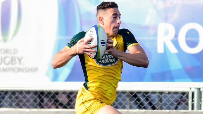 ROSARIO, ARGENTINA - JUNE 22: Mark Nawaqanitawase of Australia U20 runs to score a try during the final match of World Rugby U20 Championship 2019 between Australia U20 and France U20 at Racecourse Stadium on June 22, 2019 in Rosario, Argentina. (Photo by Amilcar Orfali/Getty Images)