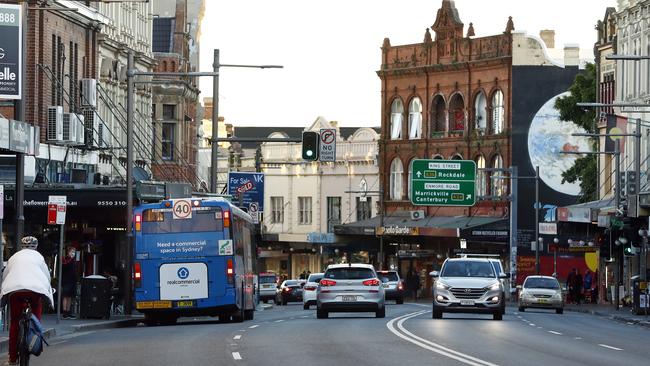 WEEKEND TELEGRAPH - 25/6/21King St in Newtown is divided as one side of the street goers into lockdown and the other side is free to trade. Picture: Sam Ruttyn