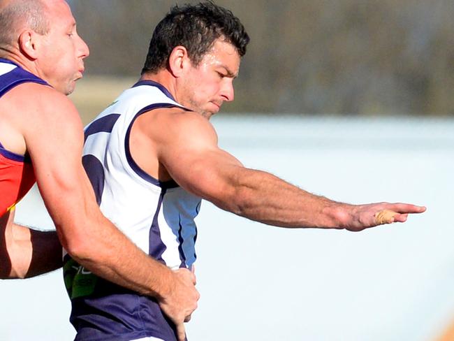 RDFL footy: Diggers Rest versus Melton Centrals at Diggers Rest Recreation Reserve.Diggers Rest's Craig Harvey,1 tackles Melton Central's Rex Hickman,5Pictures:Angie Basdekis