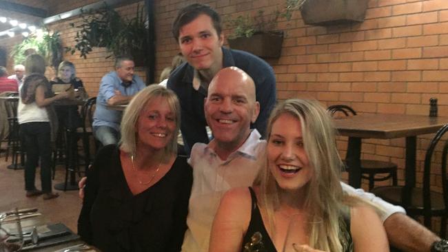 Brodie Ellis with his mother, stepfather and sister.