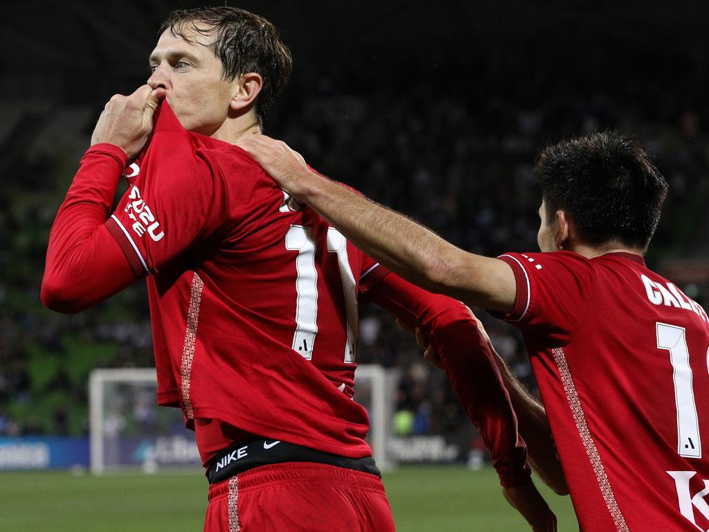 MELBOURNE, AUSTRALIA - JANUARY 08: Craig Goodwin of Adelaide United (L) celebrates his goal during the round nine A-League Men's match between Melbourne Victory and Adelaide United at AAMI Park on January 08, 2022, in Melbourne, Australia. (Photo by Graham Denholm/Getty Images)