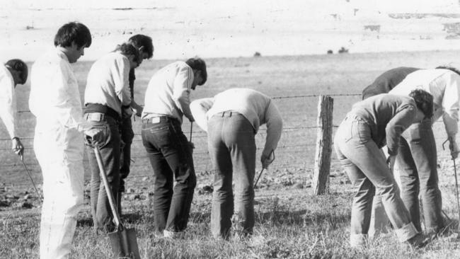 Police cadets conduct a search for the murdered boy Peter Strogneff, 14.