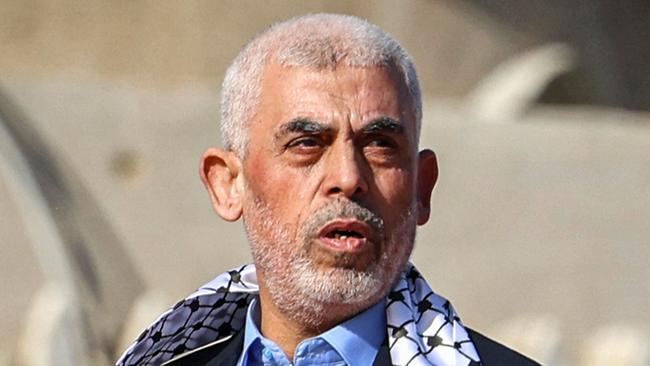 The Gaza Strip chief of the Palestinian Islamist Hamas movement, Yahya Sinwar, now political chairman, appears before supporters during a rally in 2022 marking the 35th anniversary of the group's foundation in Gaza City. Picture: Mohammed Abed / AFP