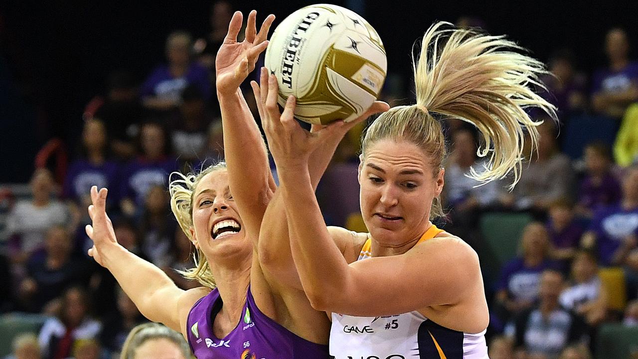 Laura Geitz (left) and Caitlin Bassett clash in a game defined by desperation. Picture: AAP