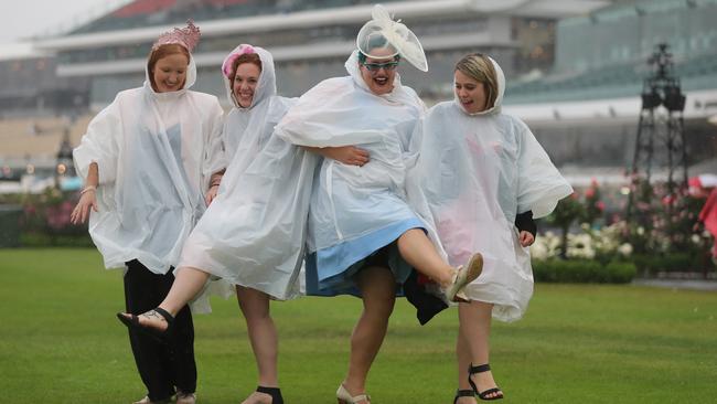 Cup goers Yvonne Maxwell, Melissa Piper, Maelly Bellm and Laura Murphy are enjoying the conditions at Flemington. Picture: Alex Coppel