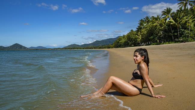 Ilaria Visicale enjoying the winter sun in Palm Cove last month after arriving from Sydney. The blue skies are set to return from Wednesday. Picture: Brian Cassey