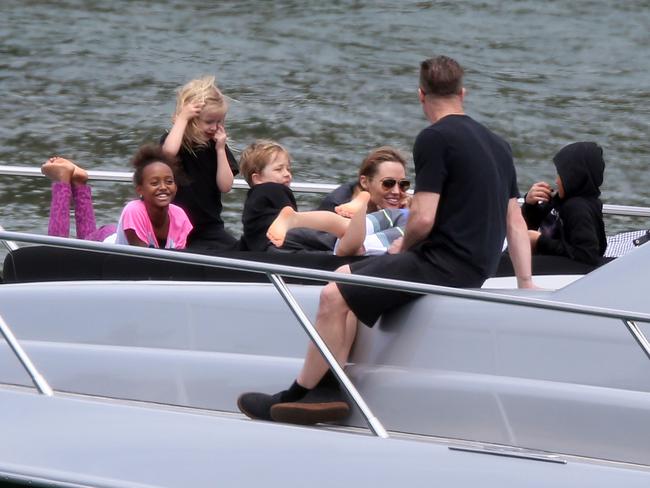 Brad Pitt and Angelina Jolie spend the day with their children on board a luxury yacht named “Ghost” in Sydney Harbour, Australia on December 3, 2013. Picture: INF