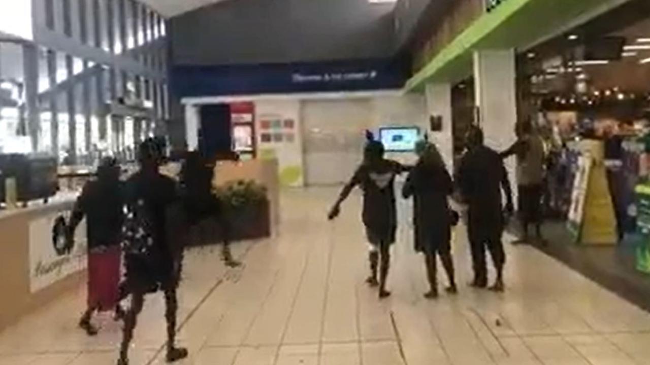 Footage from a knife fight outside the Darwin CBD Woolworths.