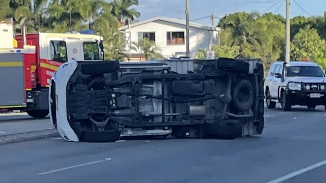 Car on its side after three-vehicle crash on Hugh St
