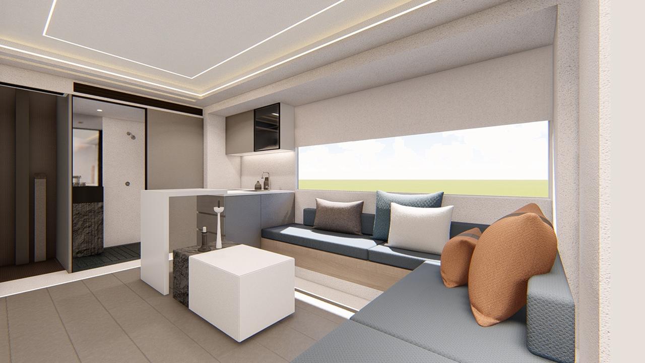 An L-shaped couch gives the motor home a homey feel.