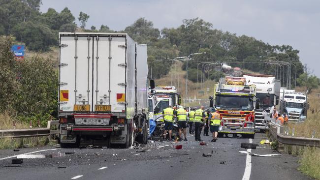 Fatal crash involving one car and two trucks on the Oakey Bypass, Warrego Highway. Tuesday, January 24, 2023. Picture: Nev Madsen.