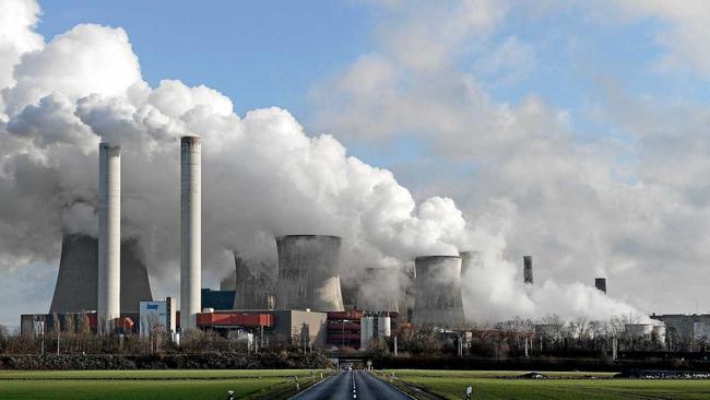 Steam rises from a coal-fired power plant. Picture: SASCHA STEINBACH