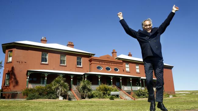 Randwick Mayor Noel D'Souza jumps for joy outside the old cable station, now the La Perouse Museum. Picture: John Appleyard