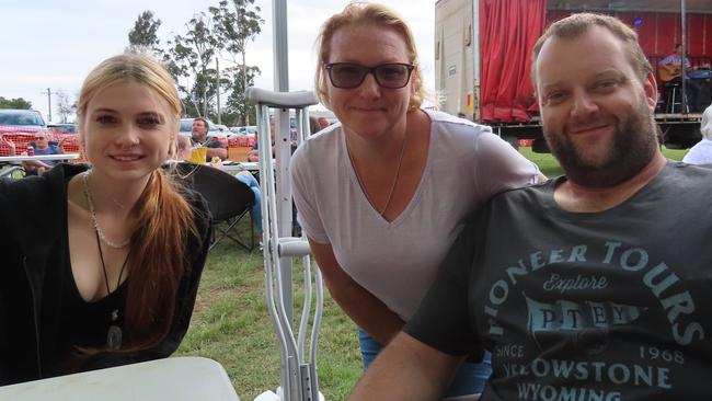 Isabella, Tammy, Jason Lavis at ‘Dinner Under the Stars’ by the Kingaroy Men’s Shed.