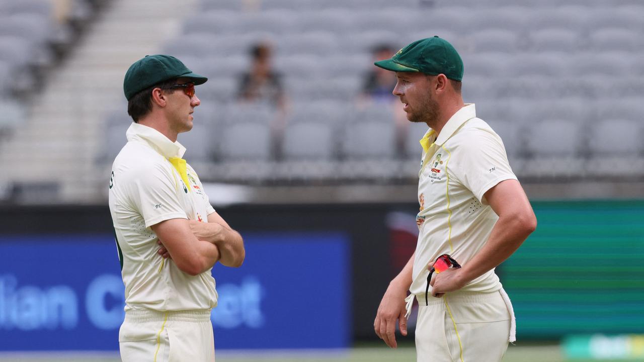 Australian captain Pat Cummins (L) and fellow fast bowler Josh Hazlewood talk during the Perth Test. Picture: AFP