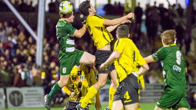 HIGH POINTS: Western Pride captain Jesse Rigby battles for the ball in his team's historic NPL grand final win in Ipswich. Picture: Chris Simpson