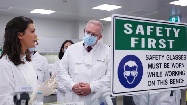 Prime Minister Scott Morrison talks to Savannah Alegre, specialist team lead of the Microbiology Laboratory at AstraZeneca. Picture: Getty Images