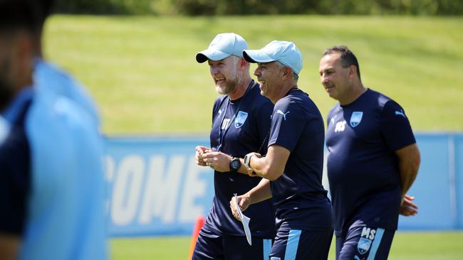 DAILY TELEGRAPH - Pictured at Sydney FC training in Macquarie Park today are coaching duo Ufuk Talay and Steve Corica. Picture: Tim Hunter.